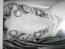 /gallery/women-back-tattoo.jpg